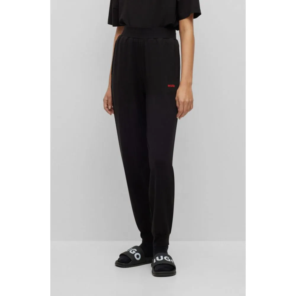 Relaxed-fit tracksuit bottoms with printed logo
